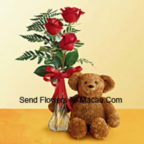 3 Red Roses With Some Ferns In A Glass Vase Along With A Cute 12 Inches Tall Teddy Bear
