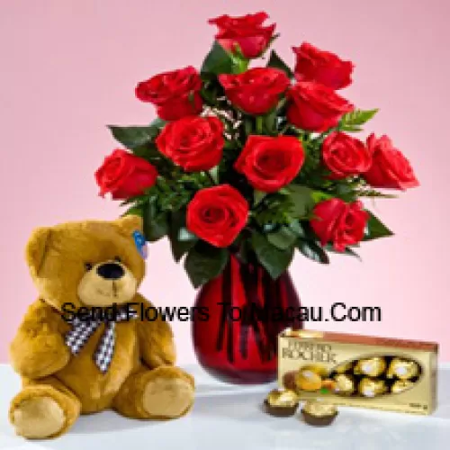 11 Red Roses With Some Ferns In A Glass Vase, A Cute 12 Inches Tall Brown Teddy Bear And A Box Of 16 Pcs Ferrero Rocher Chocolate