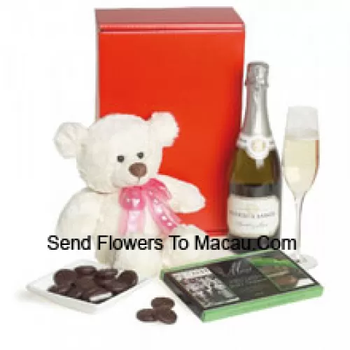 This exclusive wine hamper comes with Pierre Legendre Brut Sparkling (France) accompanied with an 8 Inches Cute White Teddy Bear And An Imported Box Of Chocolate. (Contents of basket including wine may vary by season and delivery location. In case of unavailability of a certain product we will substitute the same with a product of equal or higher value)